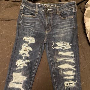 Dark wash, ripped American Eagle skinny jeggings